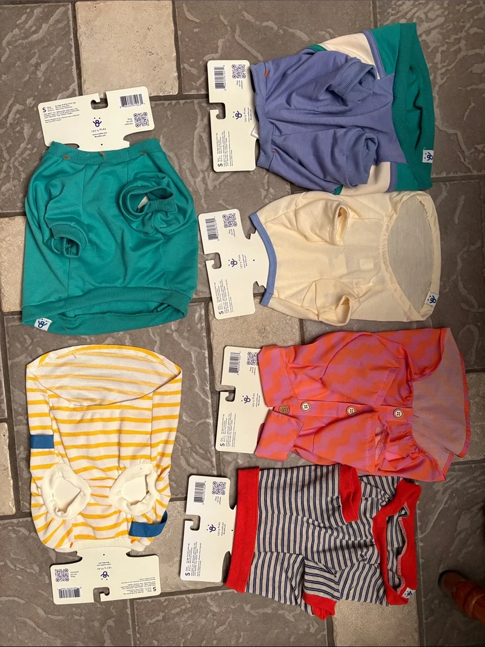 New lot six pieces of dog clothing, dog shirts size small fits 10 to 18 LBS